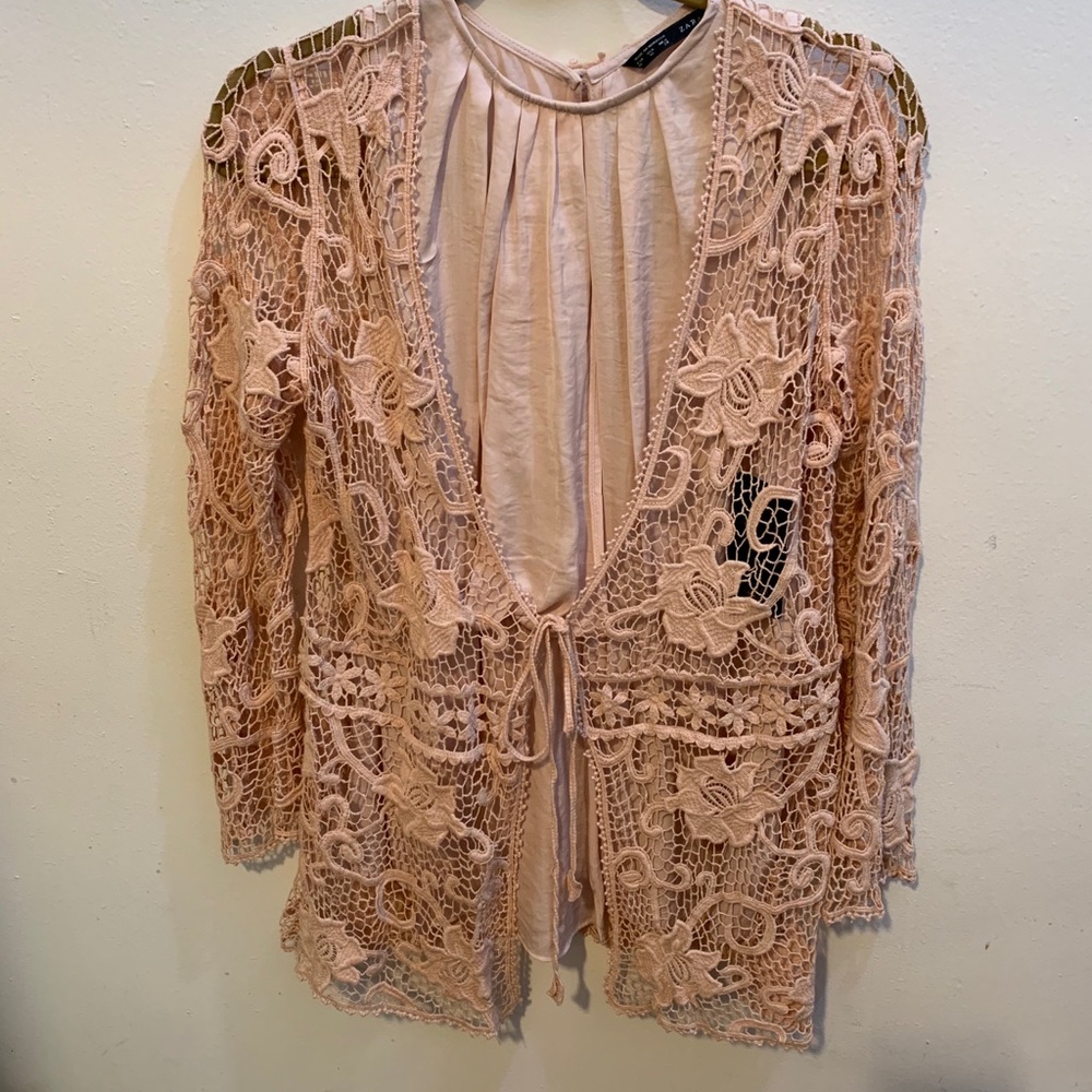 Beautiful open weave  cardigan with appliqués